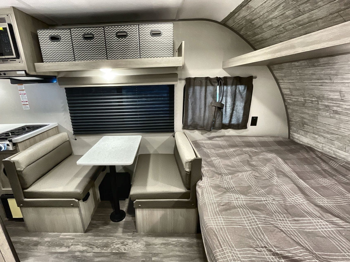 modern camper interior showing a kitchen — photo 4
