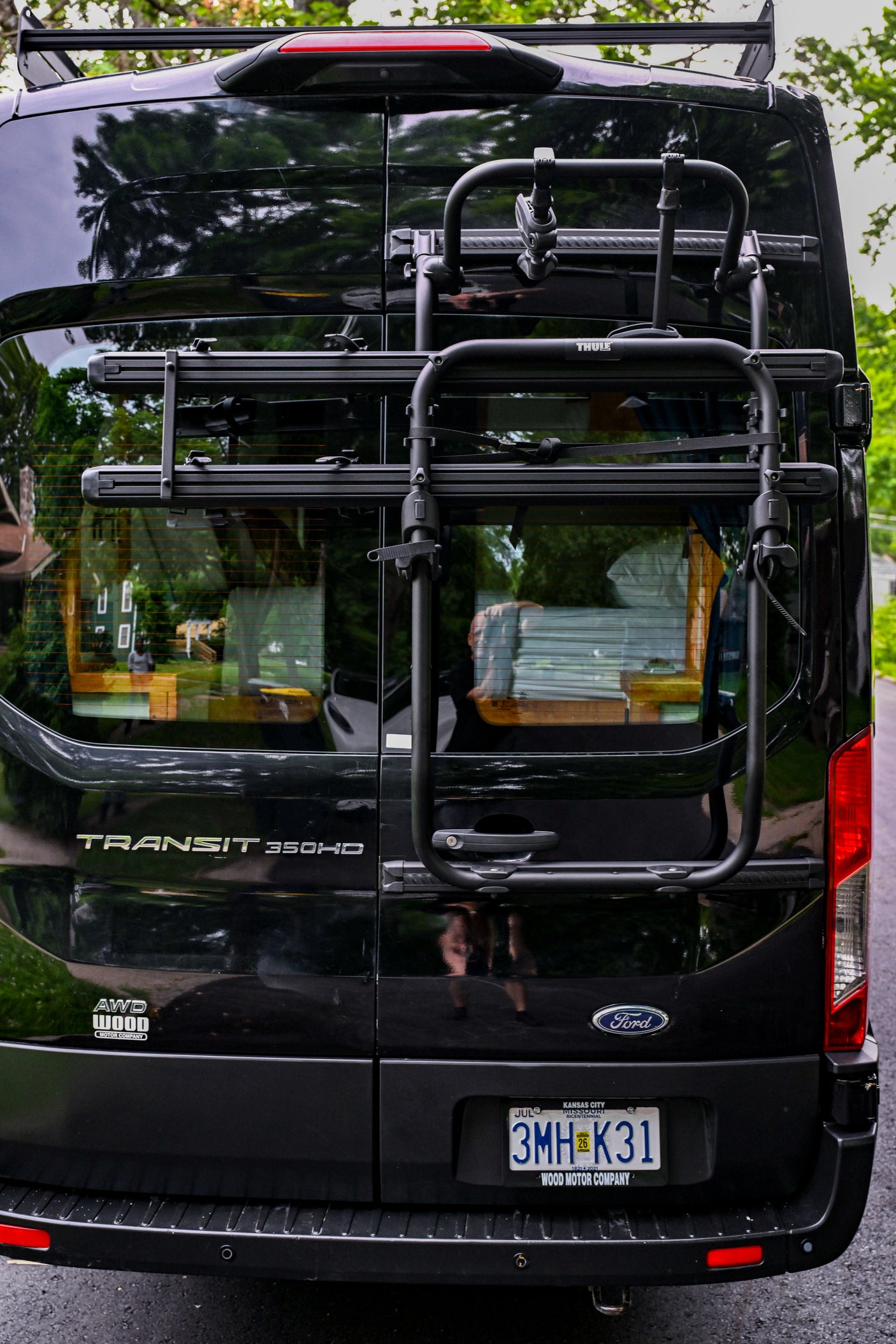 and convenient controls.|Inside this RV rental: a modern camper van conversion with a comfortable bed