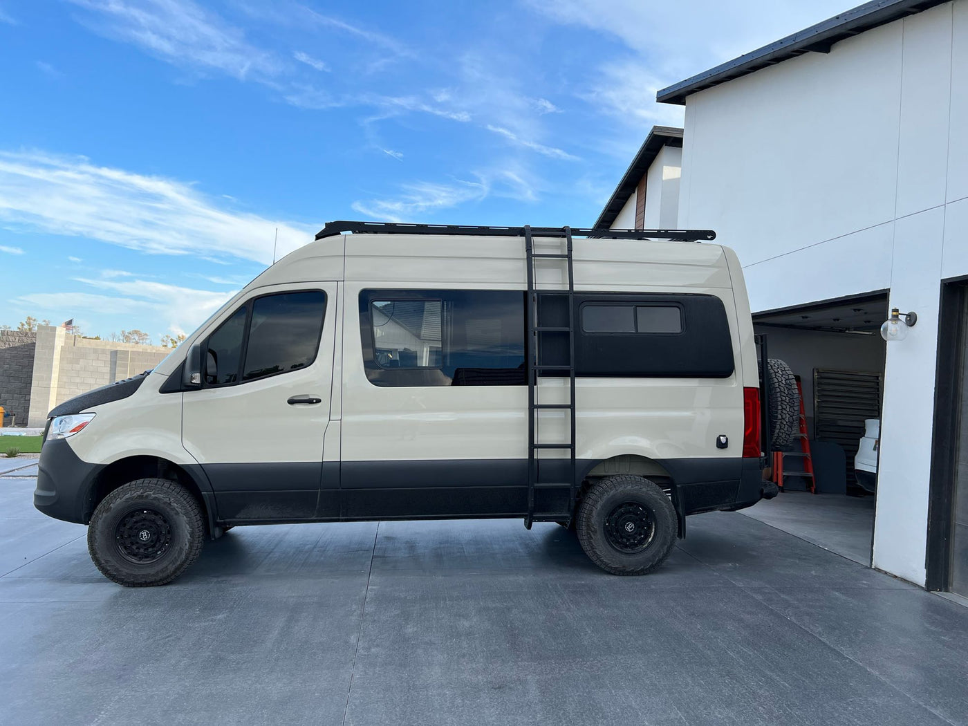 off-road Sprinter camper van. Side door open — photo 7