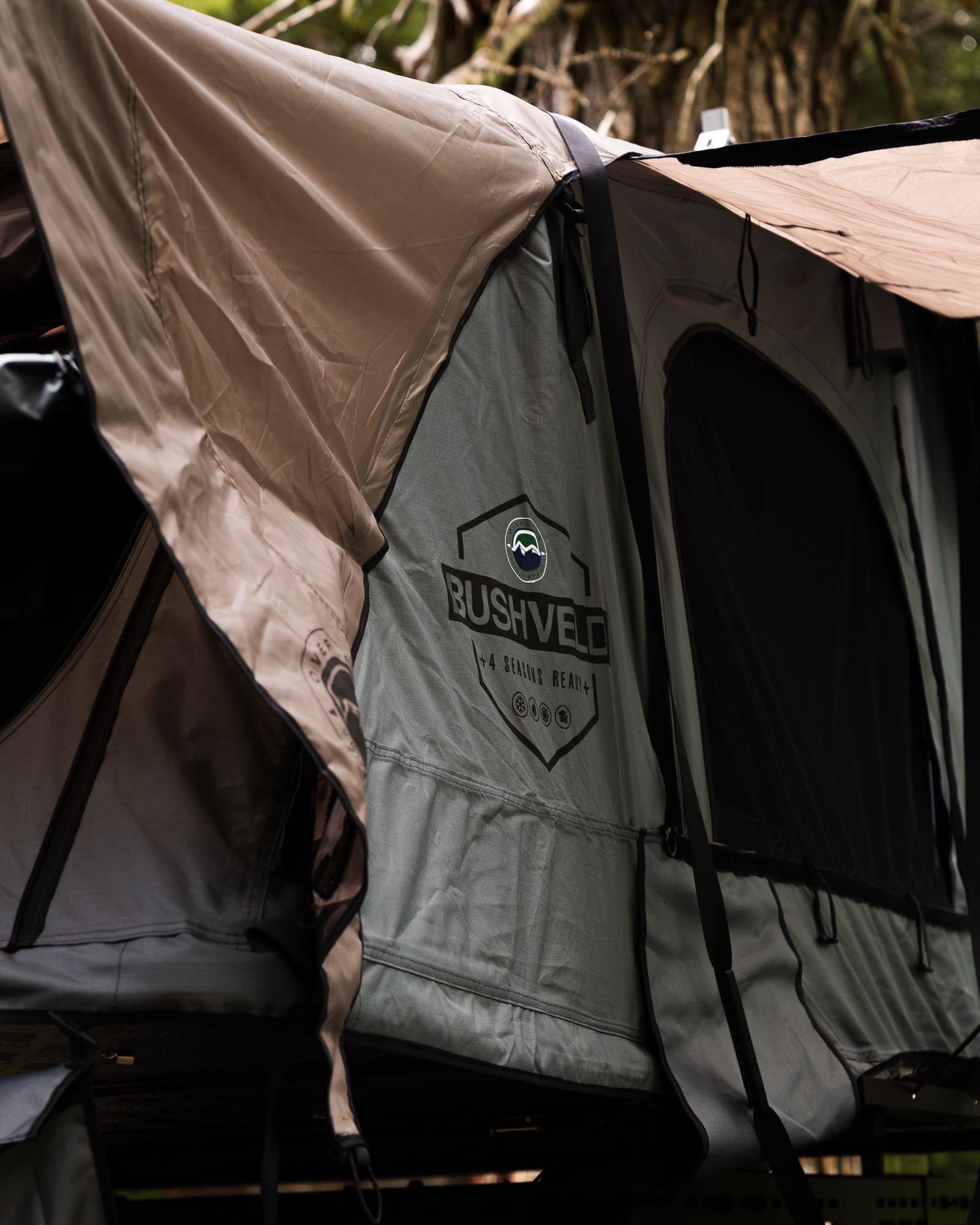 ideal for your rv rental outdoor adventure. +4 Seasons ready camping gear.|White overland truck with rooftop tent setup