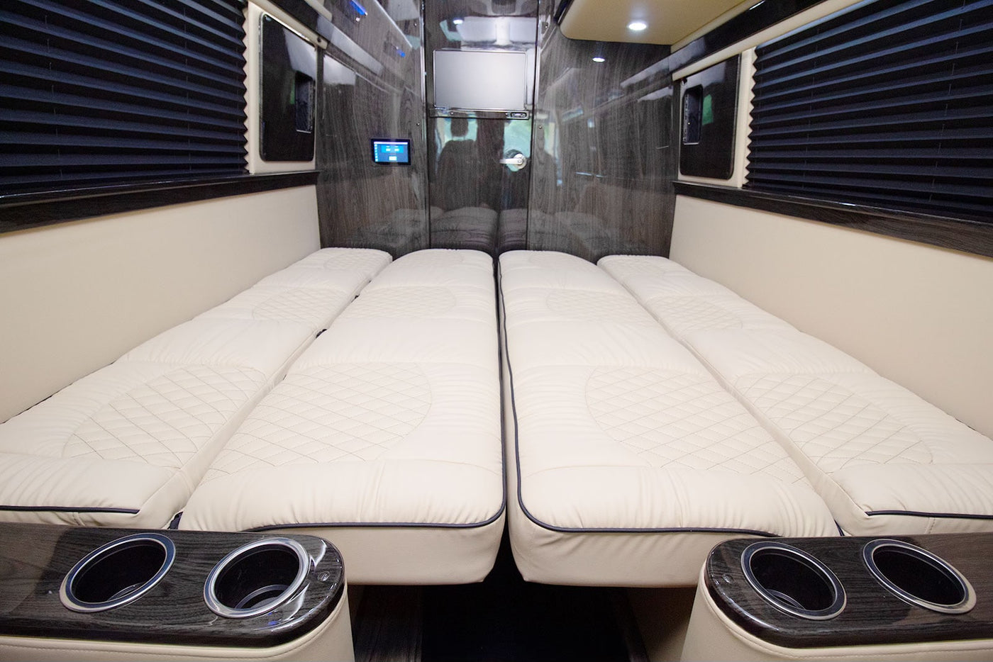 parked curbside on a residential street.|Black Mercedes Sprinter 3500XD RV rental — photo 5