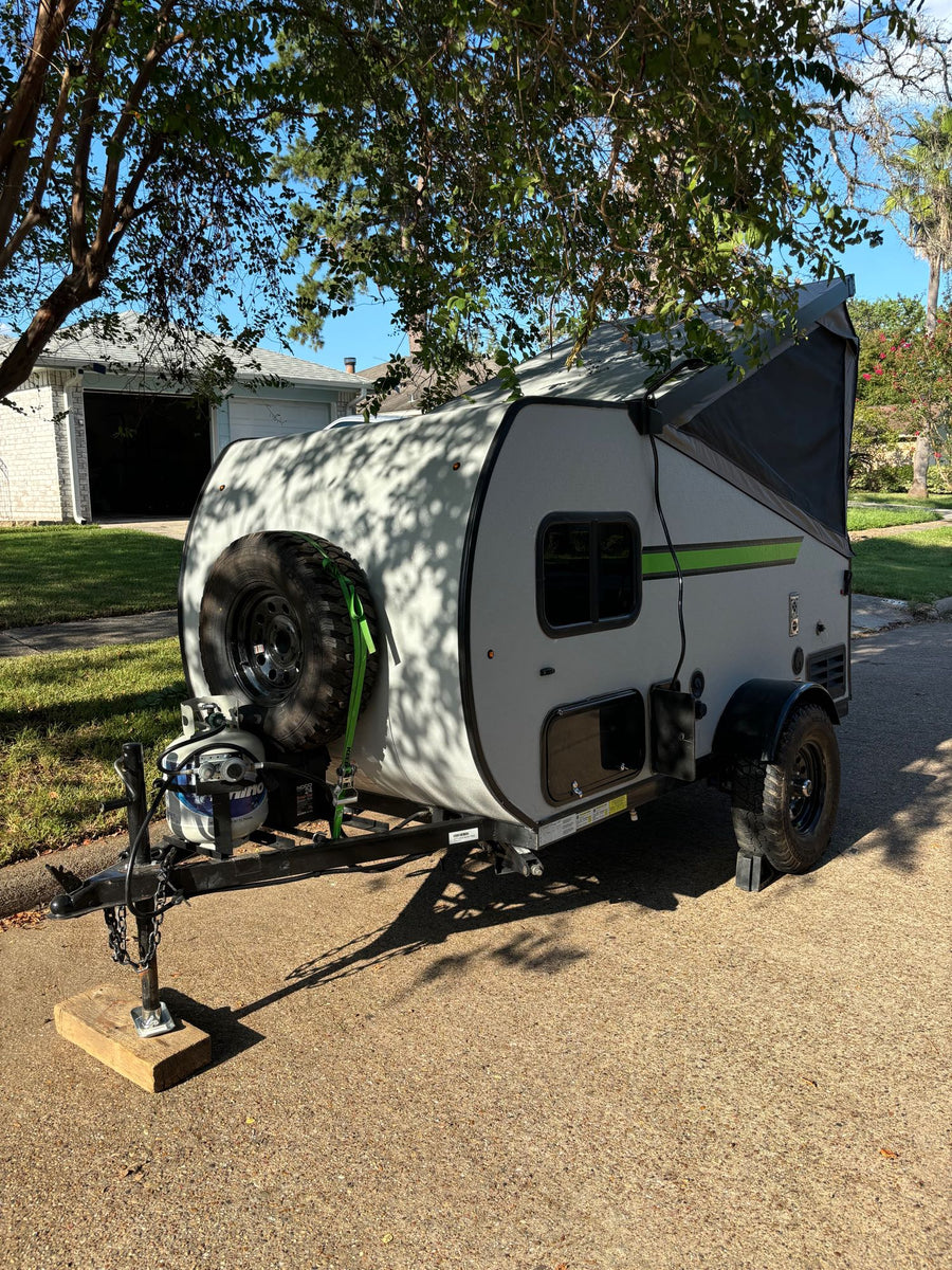 This gray teardrop camper is ready for your next rv rental. Perfect for camping and outdoor adventures.|Compact RV rental floor plan for a truck camper