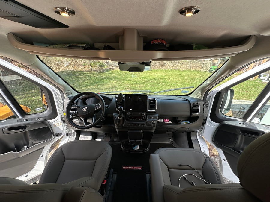 and cozy living area with seating.|RV rental van interior: view of the modern dashboard