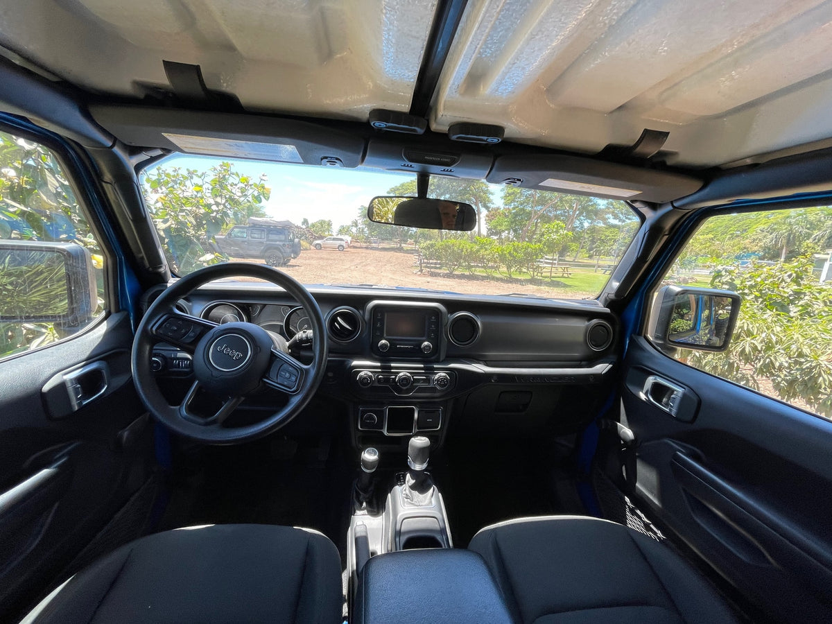 ideal for an RV rental camping trip.|View from a blue Jeep's interior: dashboard — photo 31