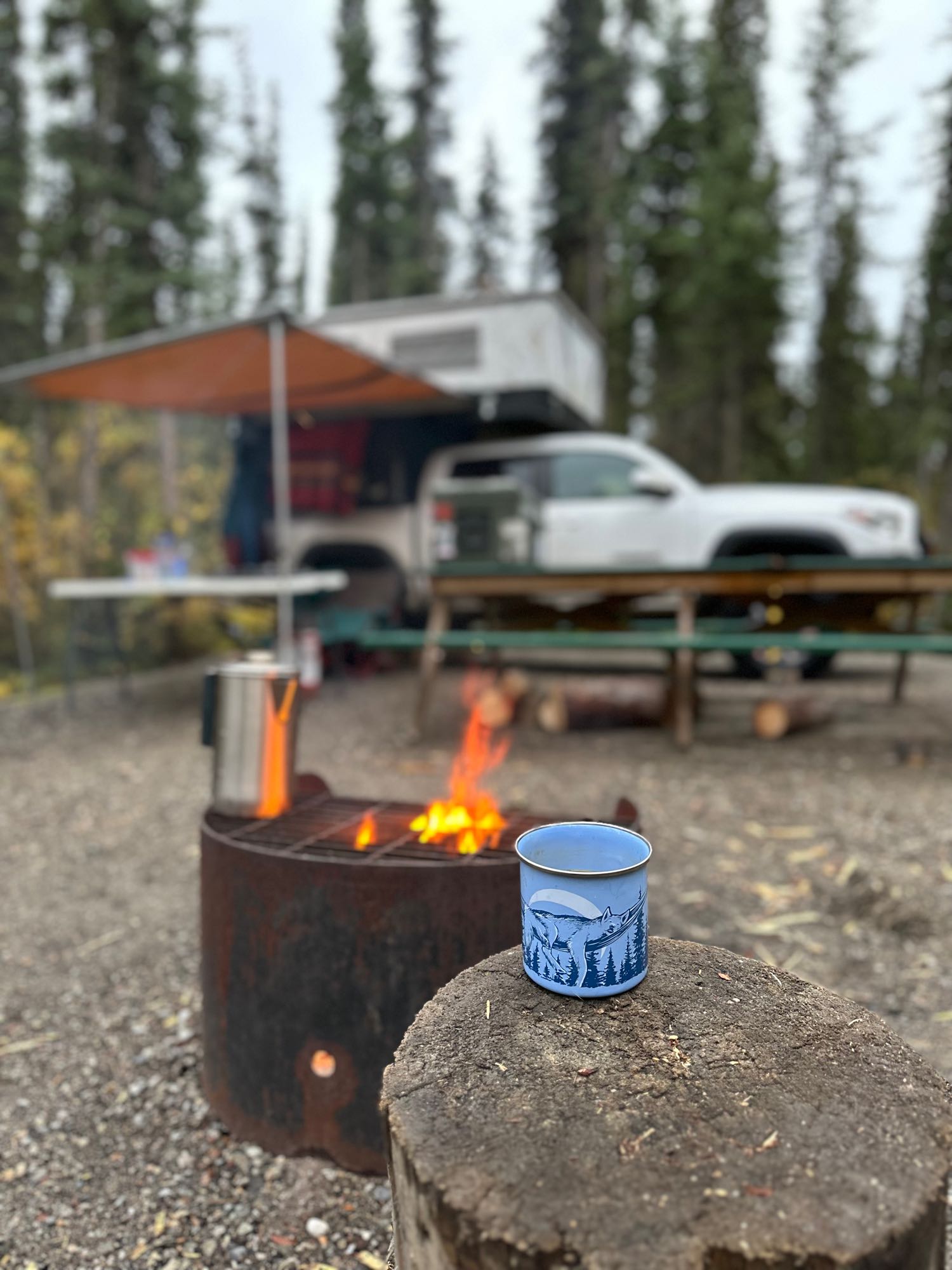 on an autumn dirt road with mountains. Ideal for your next RV rental adventure!|Cozy RV rental interior with multiple beds