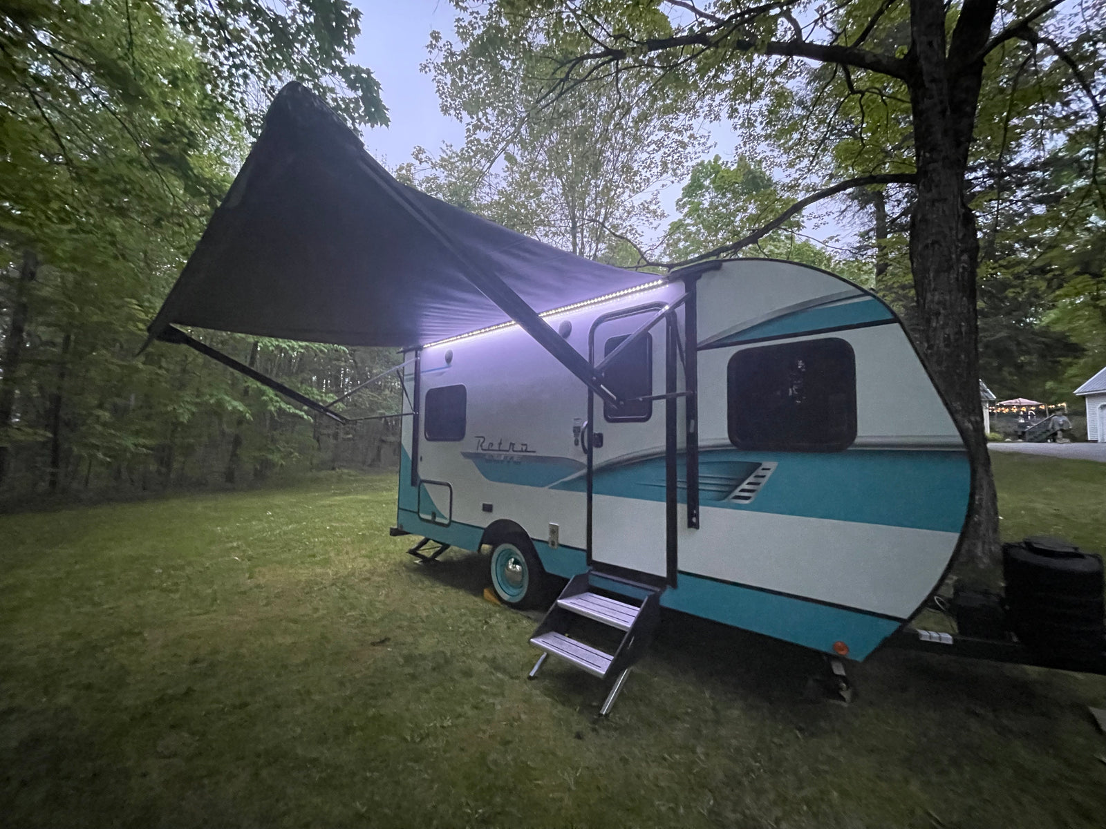 and boating. An RV rental makes waterfront adventures easy!|RV rental kitchen featuring a yellow kettle on the stove