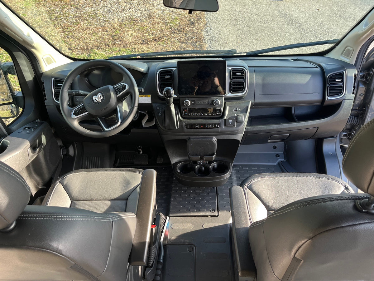Spacious RV rental cockpit with modern dashboard, large infotainment screen, and comfortable seating, ideal for road trips. — photo 12