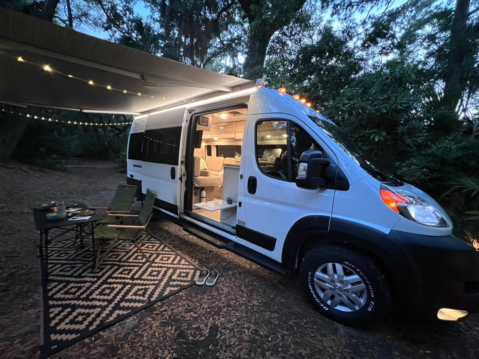 This cozy camper van RV rental features an illuminated interior