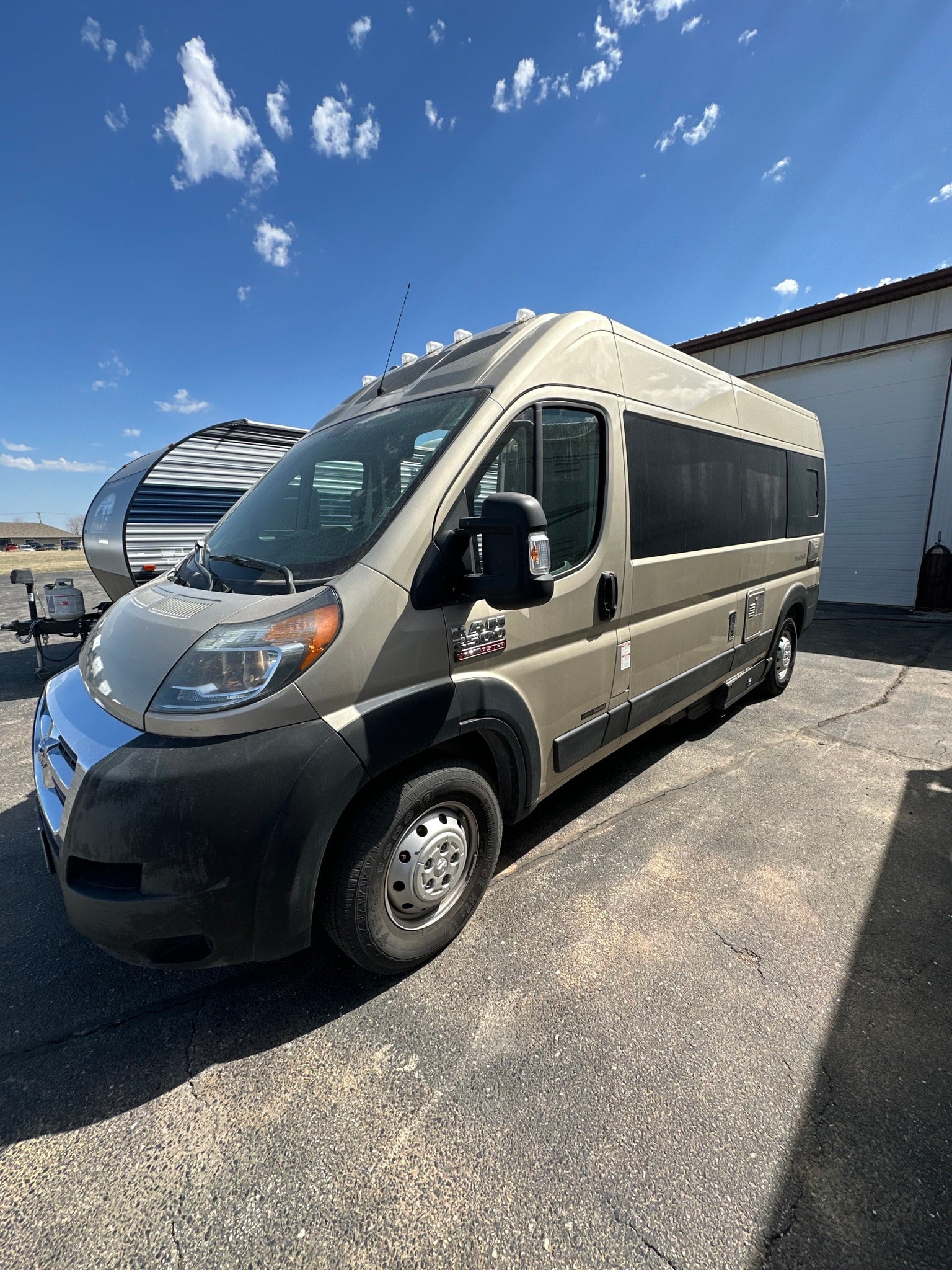 with a travel trailer & motorhome visible