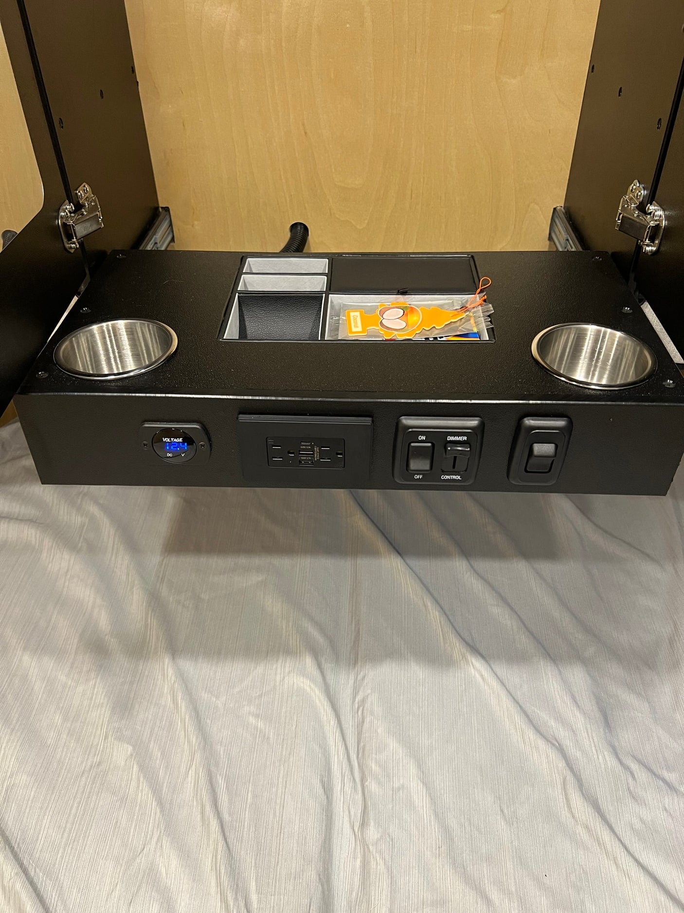 and organized compartments.|Explore this RV rental trailer's organized rear galley: stainless counter