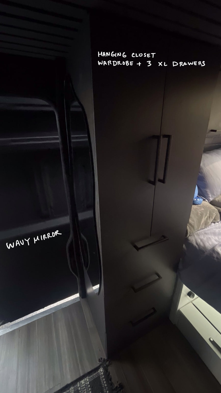 designed for compact living.|A sleek black Ram ProMaster van