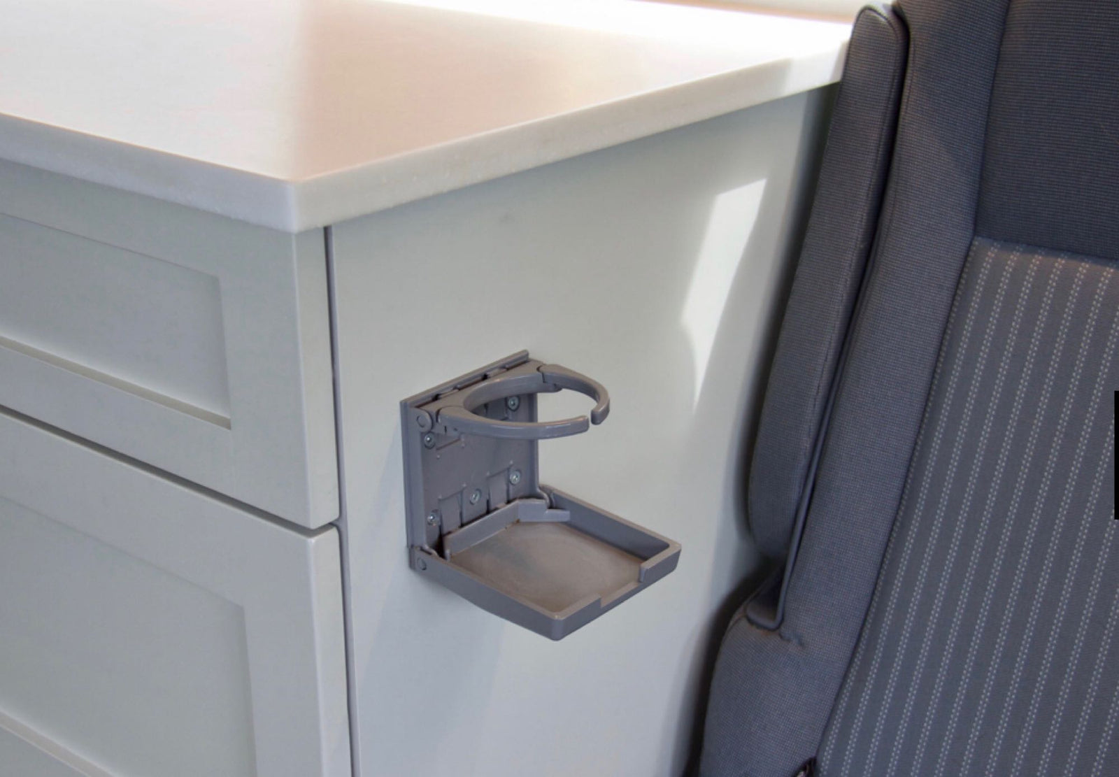 perfect for mobile adventures.|Explore this customized RV rental interior: kitchen sink