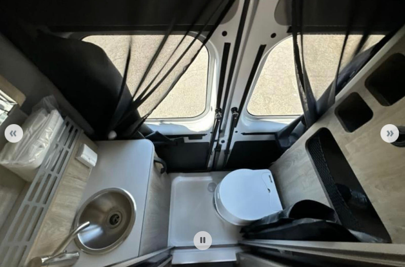 and full amenities.|Modern rv rental interior: compact kitchen (sink