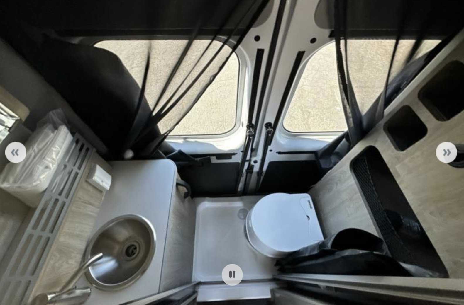 and full amenities.|Modern rv rental interior: compact kitchen (sink