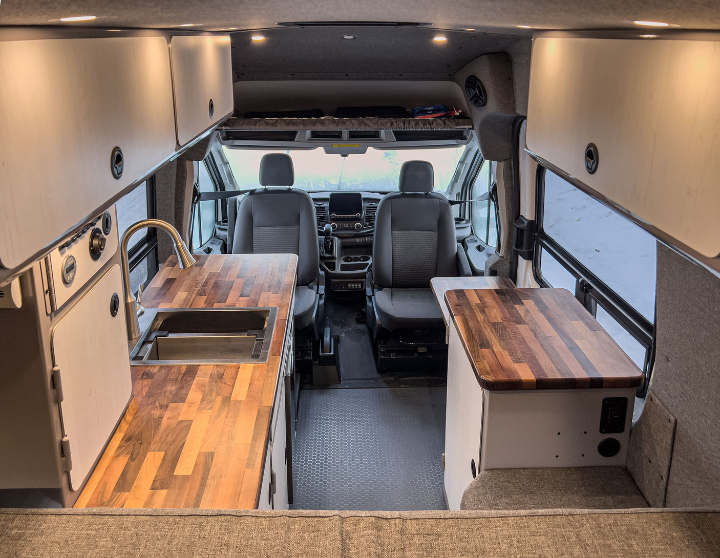 showcasing a compact kitchen with a sink