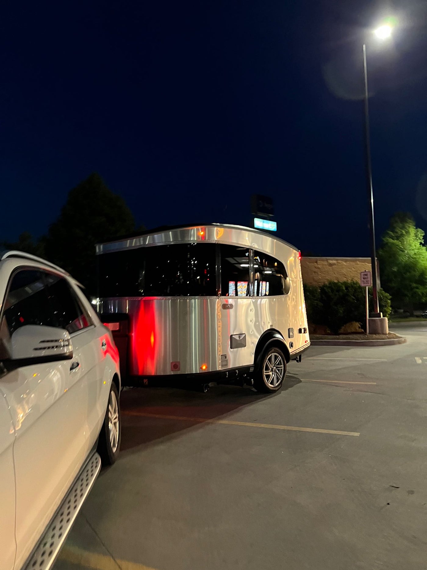 with a stunning beach & pier view. Perfect for your next getaway!|Bright and modern RV rental interior featuring comfortable dinette seating — photo 7