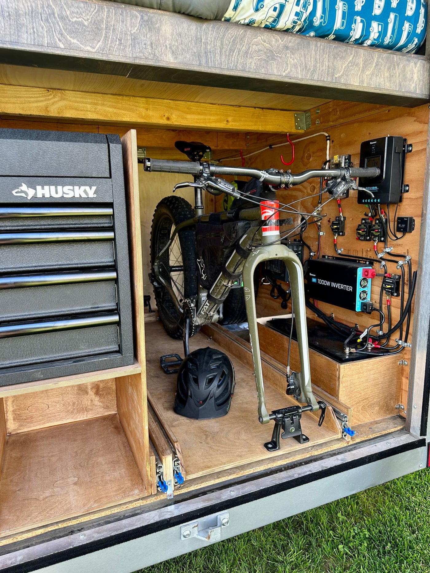 and folding table.|RV rental under-sink plumbing: pump — photo 10