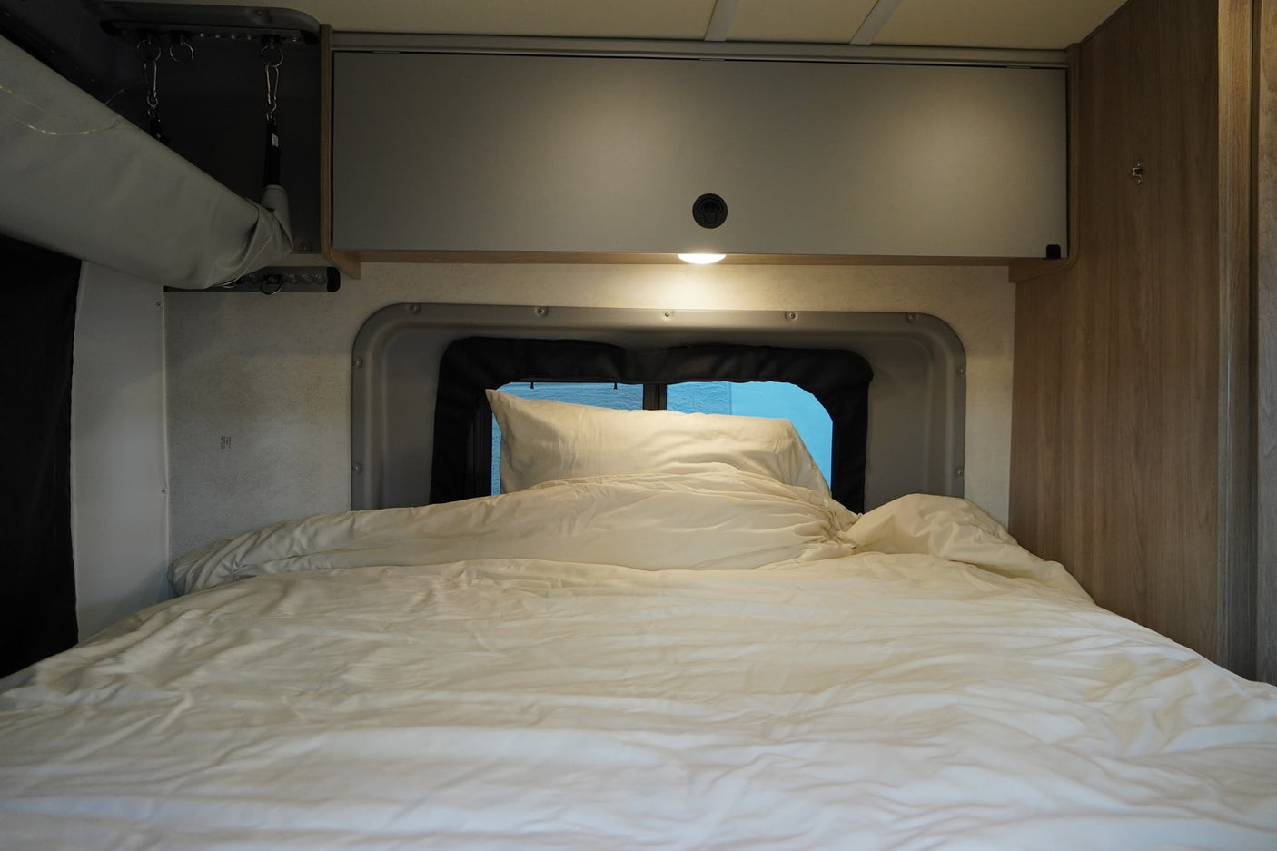 ready for adventure.|This RV rental interior showcases a compact wet bath with toilet and shower
