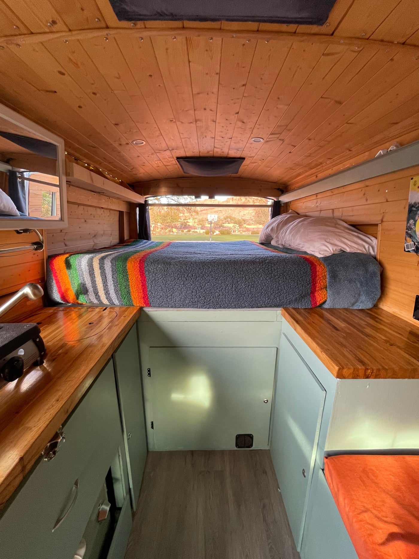 is parked on a scenic hill with doors open — photo 3