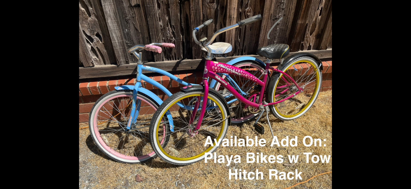 Available RV rental add-on: two colorful Playa bikes with a tow hitch rack. Perfect for your outdoor adventures.