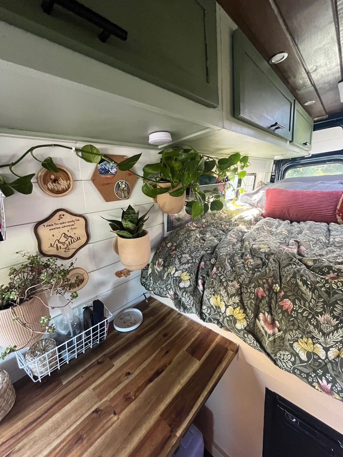with rugged mountains in the background.|Inside an RV rental: a clean — photo 9