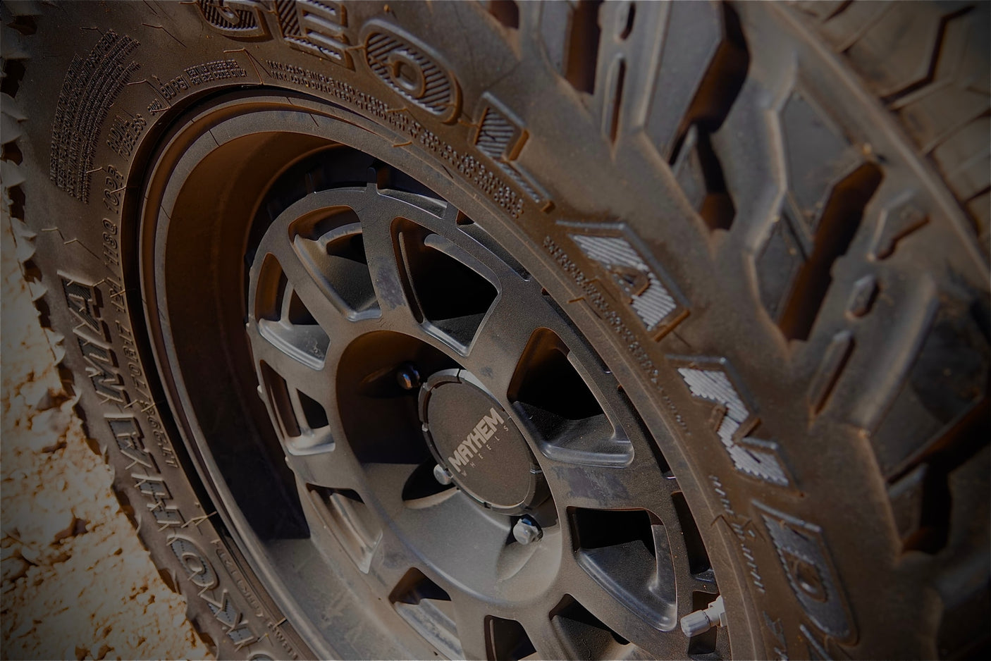 Rugged off-road tire and Mayhem custom wheel, ideal for a memorable RV rental adventure.