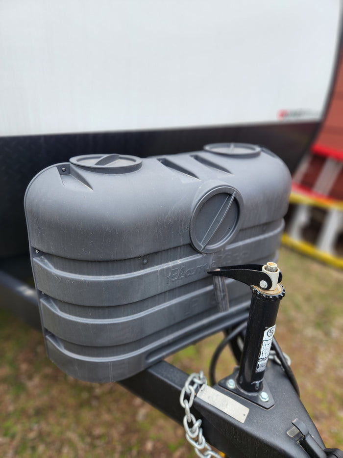 and rugged tires.|Rear entry door of an RV rental