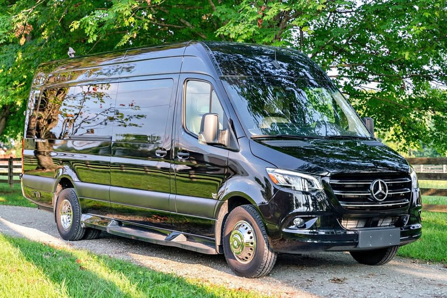 A sleek black Mercedes Sprinter luxury rv rental van