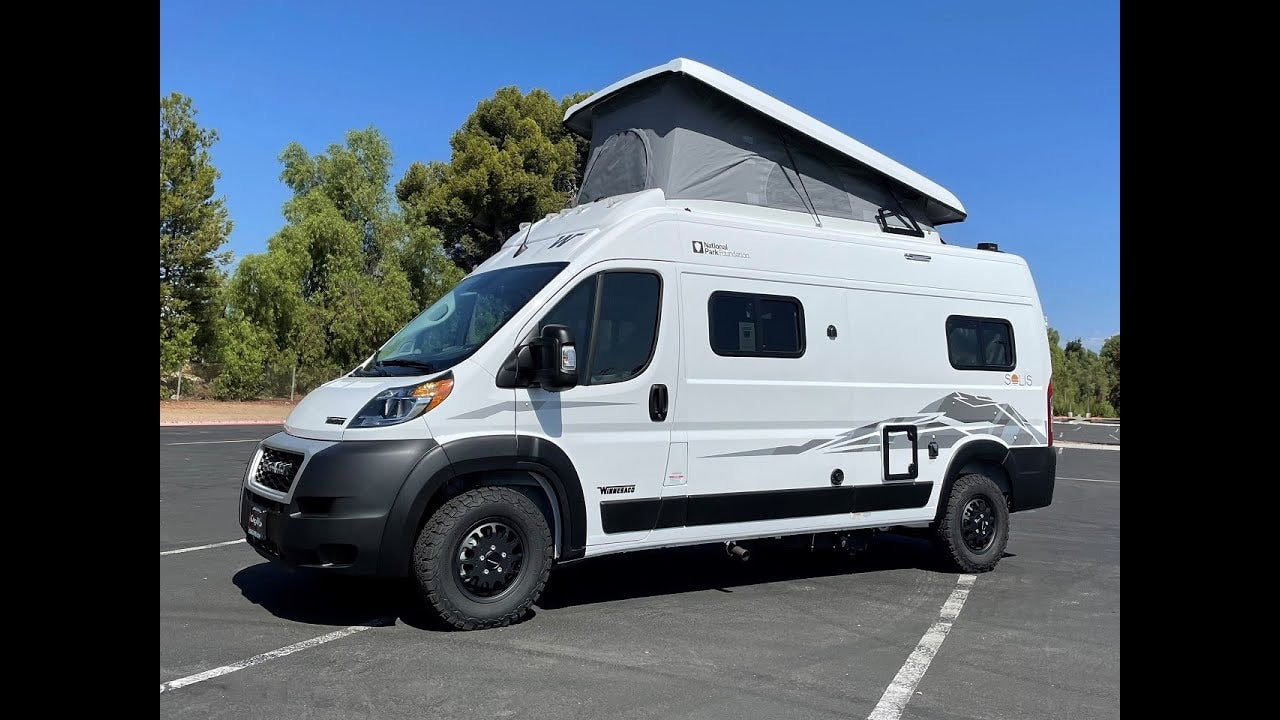 perfect for your next outdoor adventure.|This white Winnebago Solis pop-top camper van is ready for your next RV rental adventure!|White Winnebago Solis camper van for RV rental