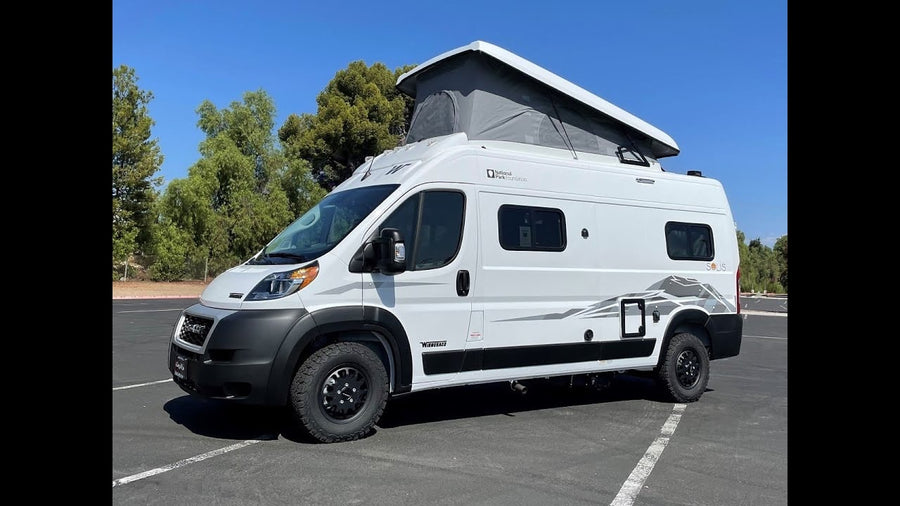 perfect for your next outdoor adventure.|This white Winnebago Solis pop-top camper van is ready for your next RV rental adventure!|White Winnebago Solis camper van for RV rental