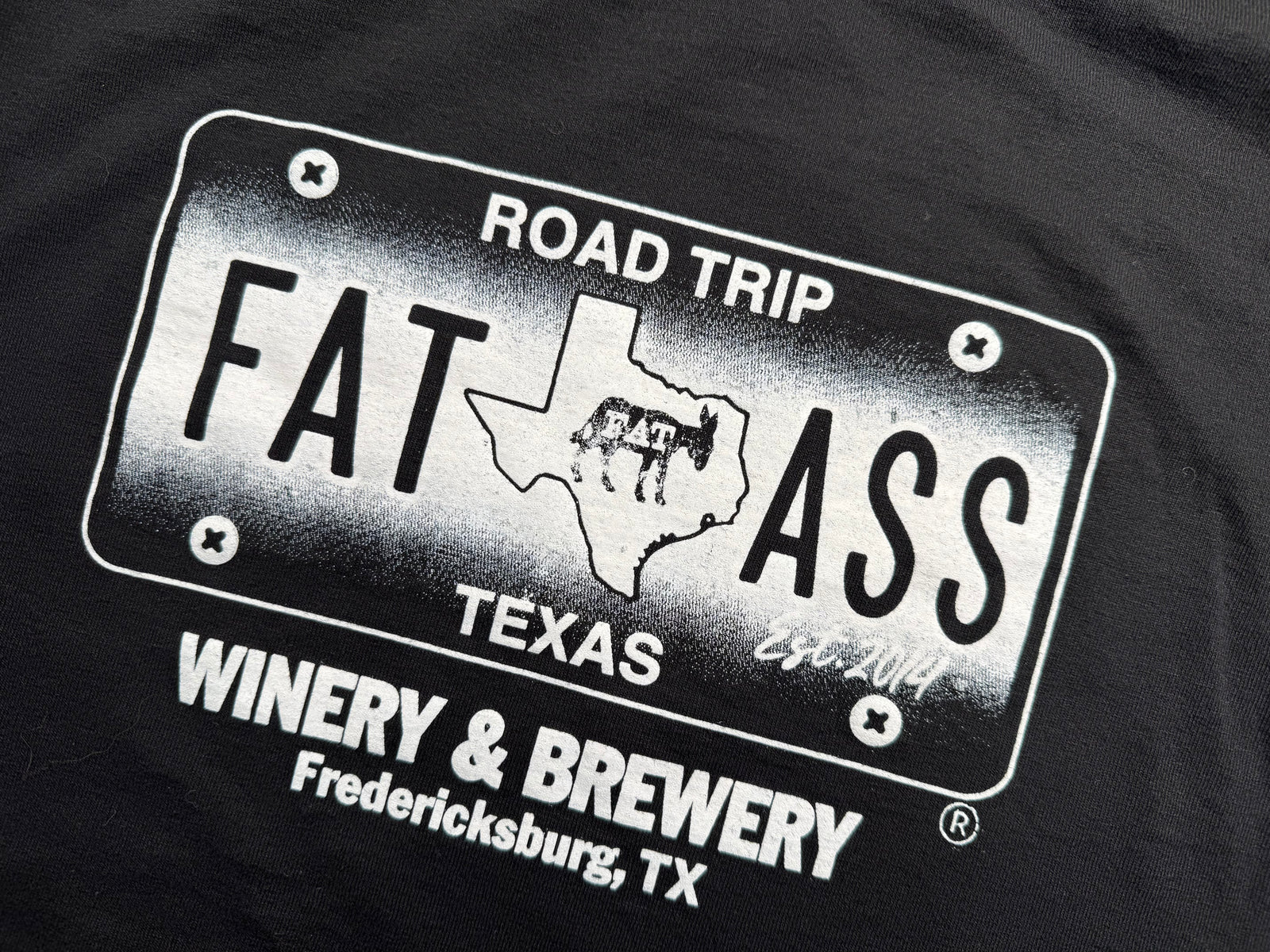 Black t-shirt: "ROAD TRIP FAT ASS TEXAS" license plate graphic, featuring donkeys & "Winery & Brewery Fredericksburg, TX". Great for an RV rental adventure!