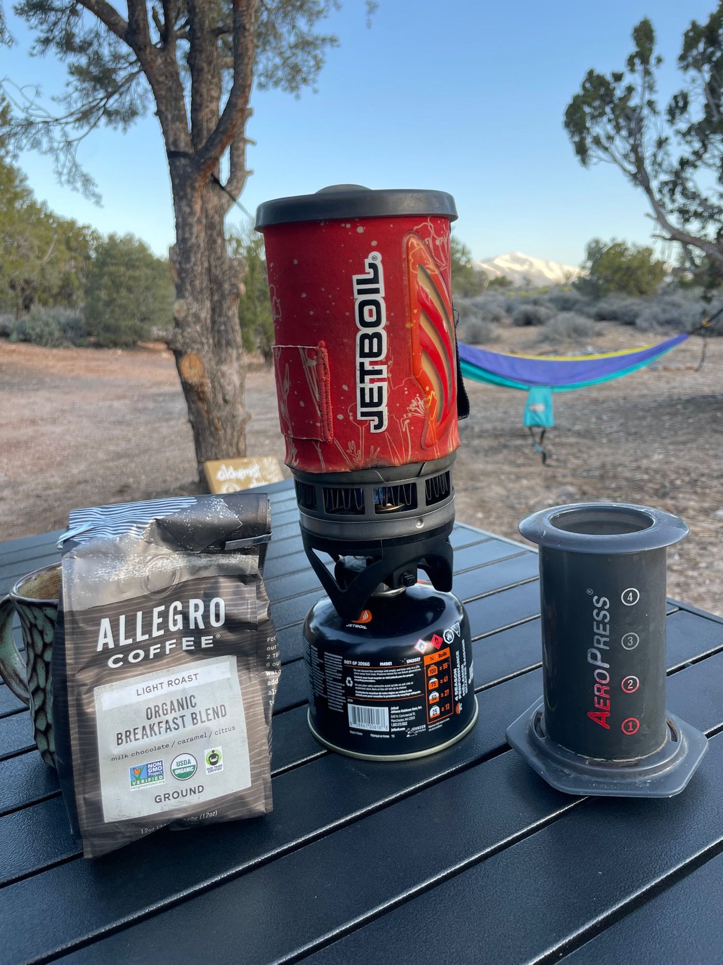 Perfect coffee setup for an RV rental trip! A Jetboil, AeroPress, and Allegro coffee ensure a great brew in the mountains.
