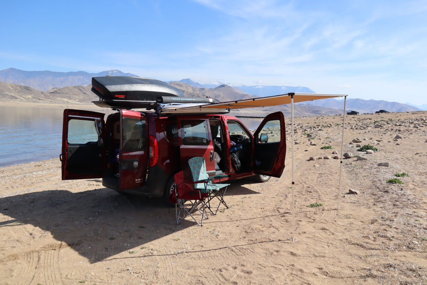 equipped with an awning & roof box