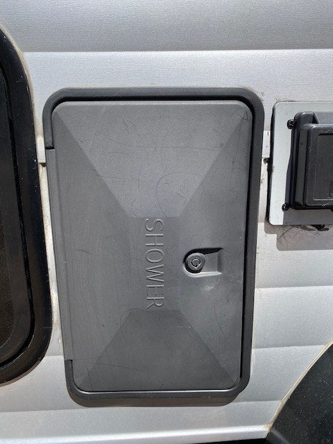 and windows.|Inside a compact RV rental