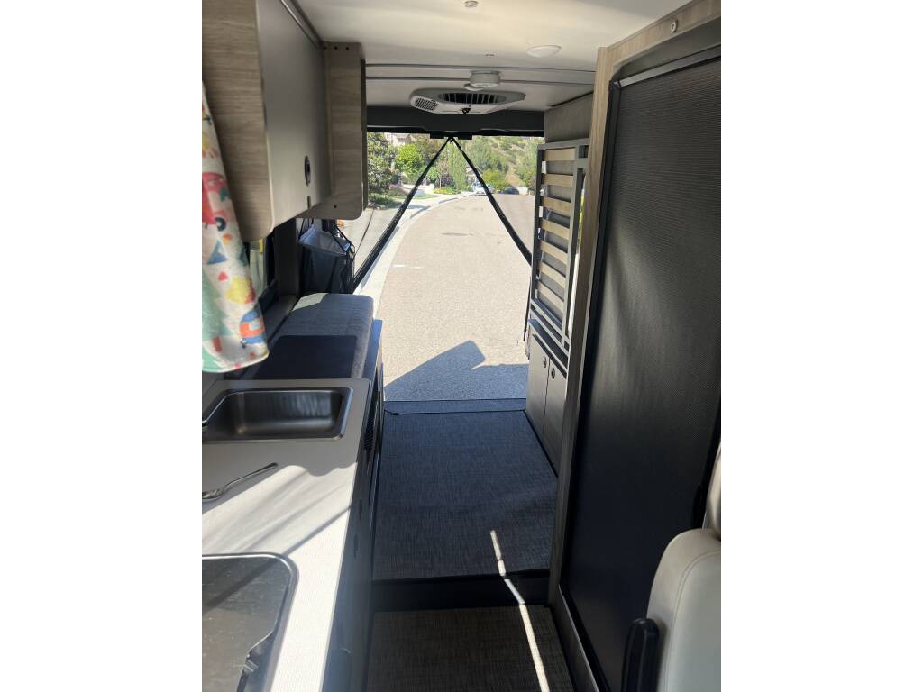ideal for travel.|Explore this RV rental's interior: swivel front seats