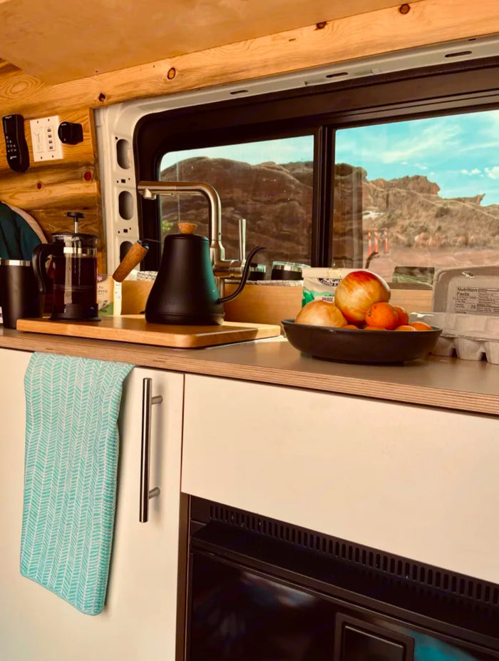 and stunning desert views. Perfect for an adventure!|This white camper van