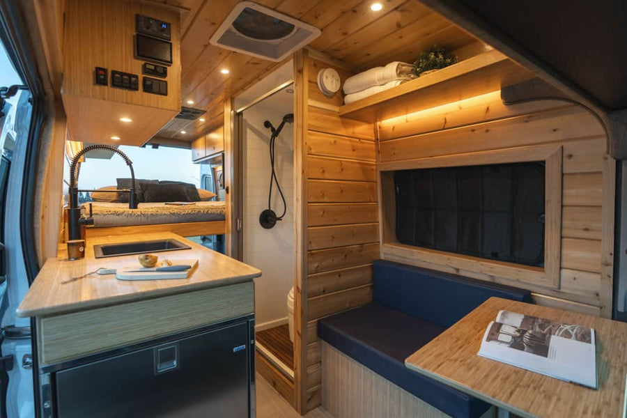 Modern RV rental interior with full kitchen