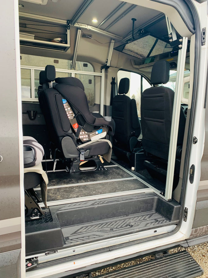 flexible floor system for adventure.|Customized camper van with open rear doors