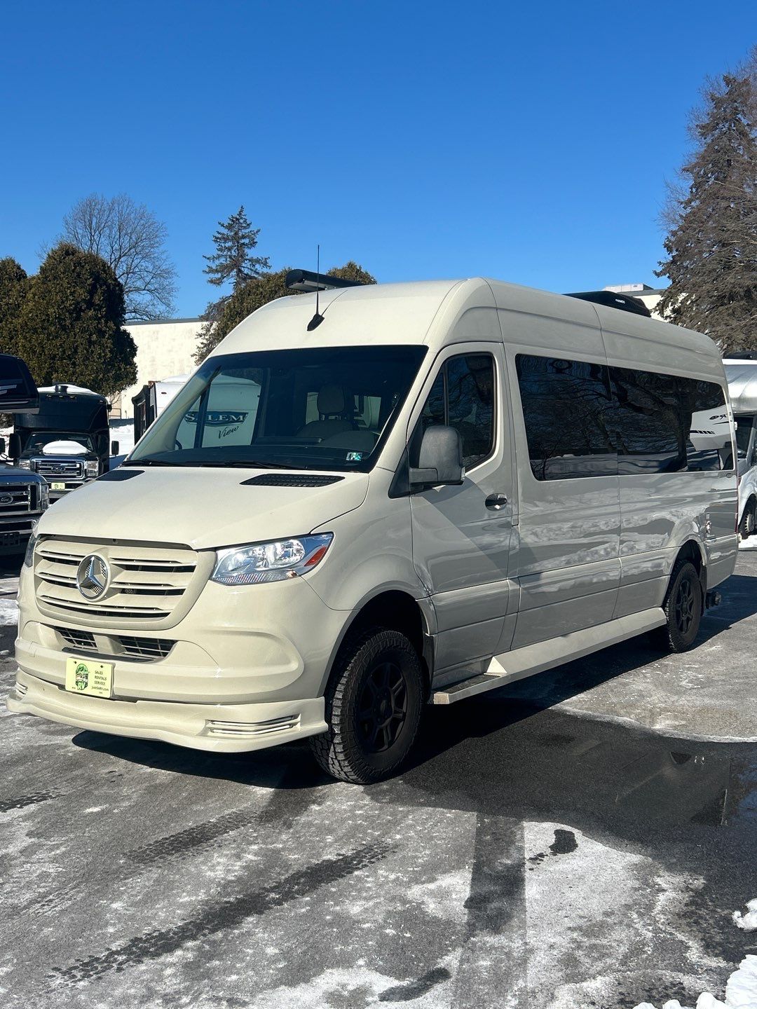 Beige Mercedes Sprinter camper van