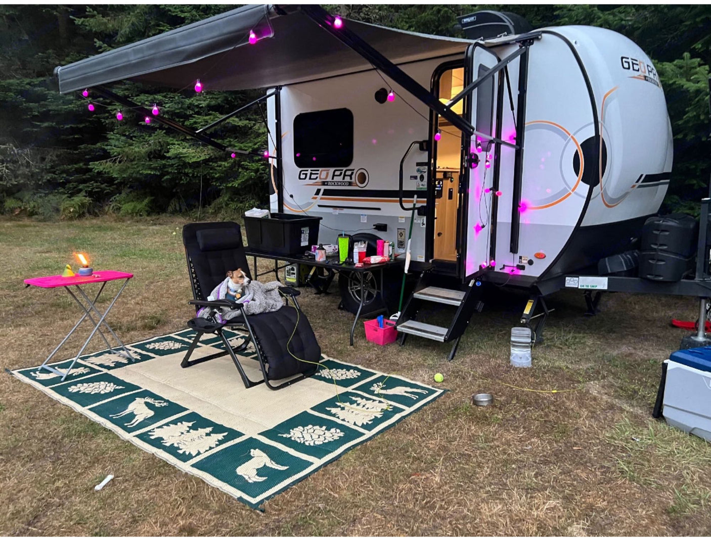 parked with camping gear in a vast