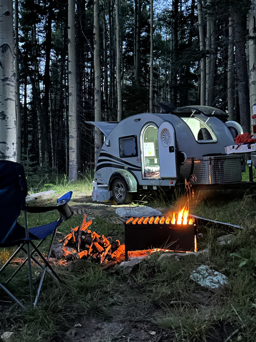 Experience peaceful forest camping with an RV rental! A small teardrop camper
