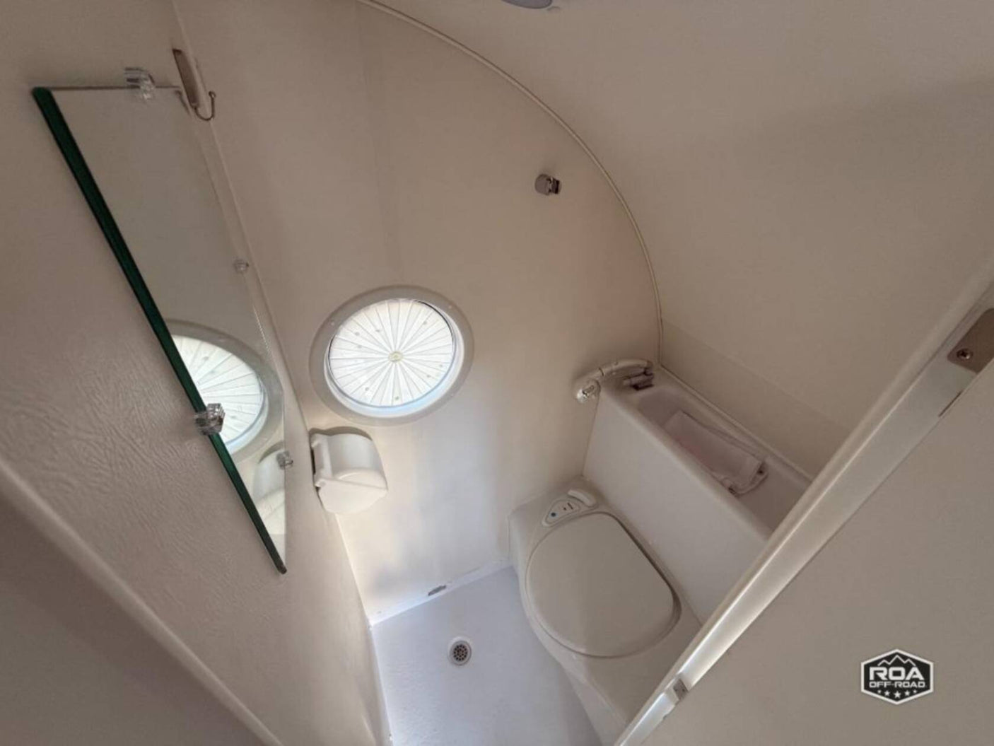 ideal for an RV rental trip.|Rear view of a T@B travel trailer in a garage
