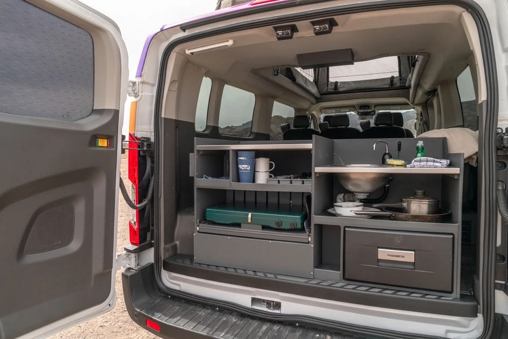 a comfy camper van bed awaits