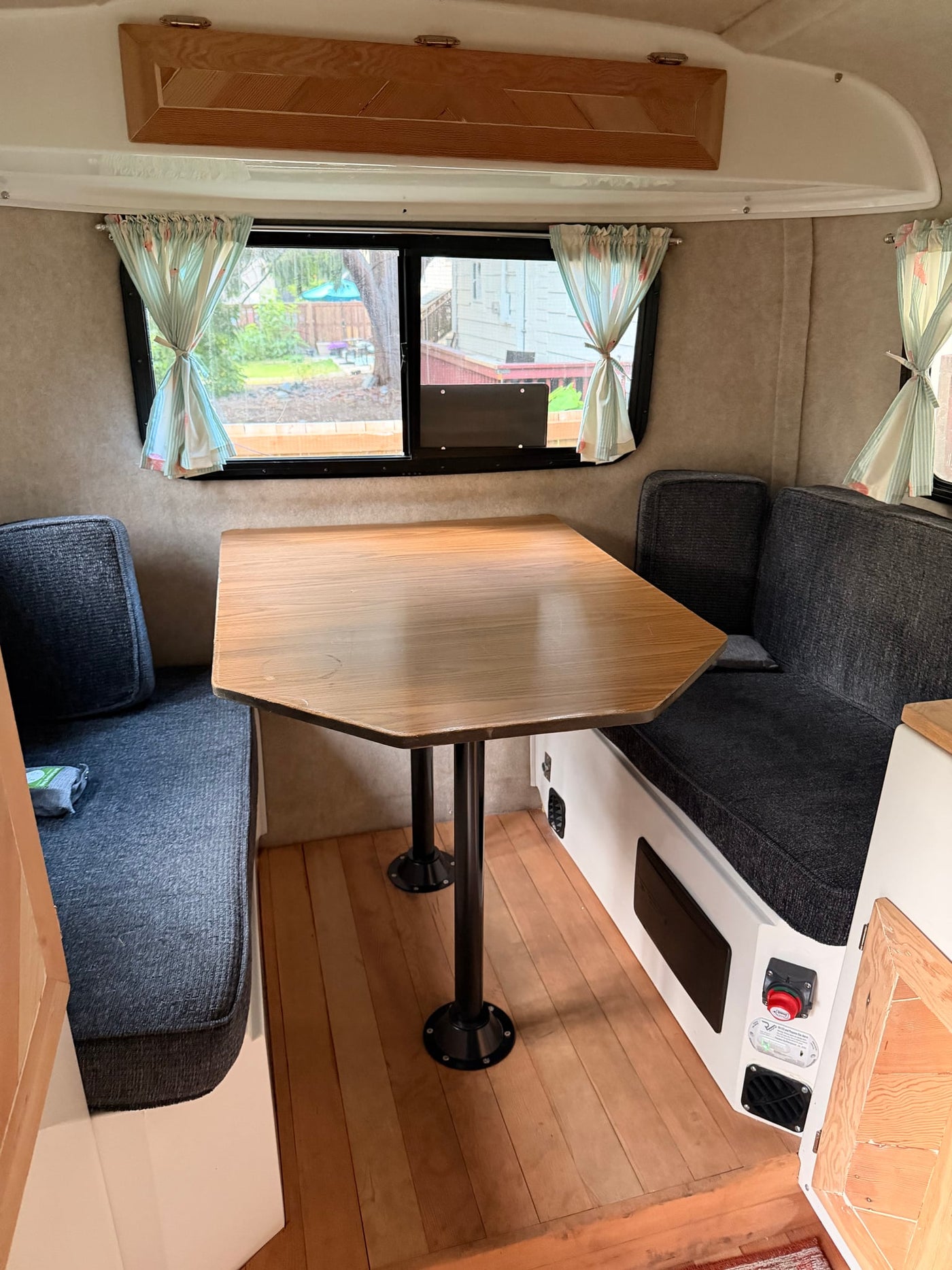 and trailer hitch.|Small cream-colored rv rental travel trailer — photo 8