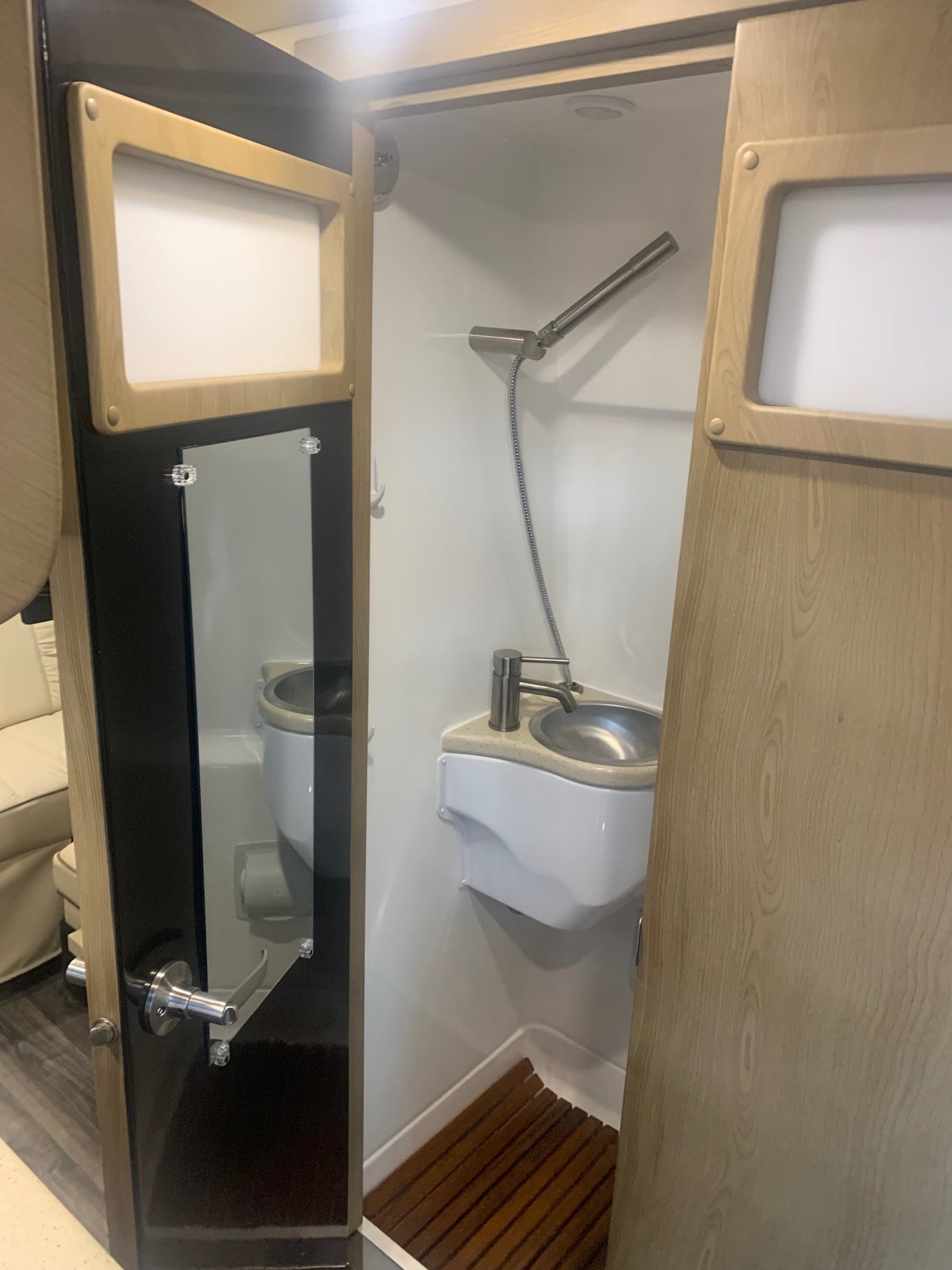 and large touchscreen displaying user profiles.|This RV rental's sophisticated control panel in a camper van displays battery