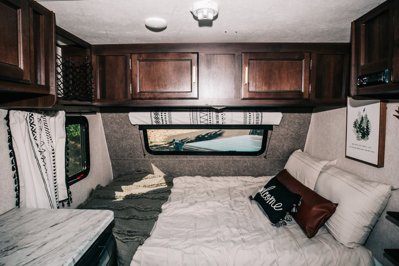 perfect for a peaceful camping trip.|This RV rental and truck are parked