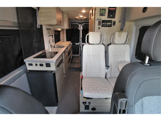 & overhead storage. Ideal for road trips and minimalist travel.|RV rental: Compact RV wet bath with toilet