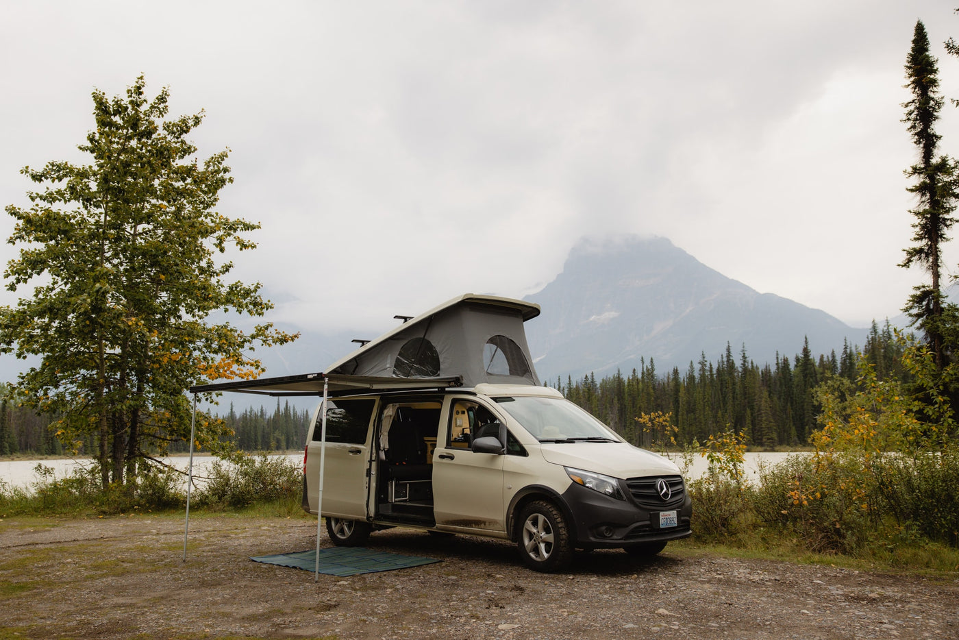 Pop-top camper van rv rental with awning — photo 1