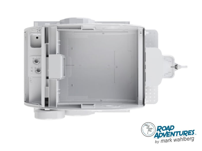 Overhead view of a white miniature travel trailer, revealing its open interior layout with sink and controls, plus hitch. Great for rv rental previews.
