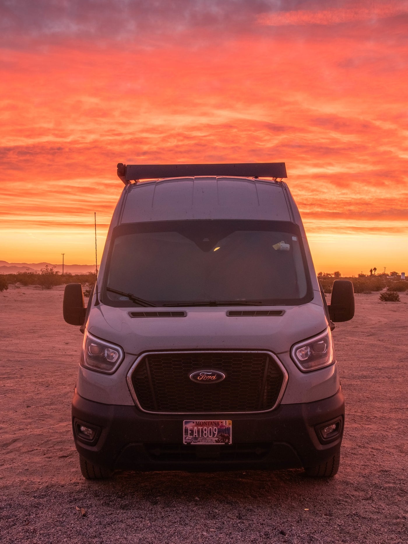 and full kitchen for mobile living.|Modern gray Ford Transit camper van — photo 11